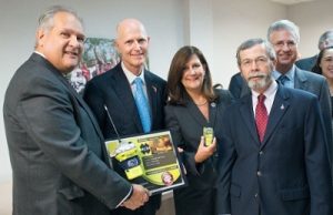 Florida Governor, Rick Scott (second to left) and ACR Electronics President, Gerry Angeli (far right) at HABCO International in Boca Raton, FL at a local manufacturers partnerships press conference.