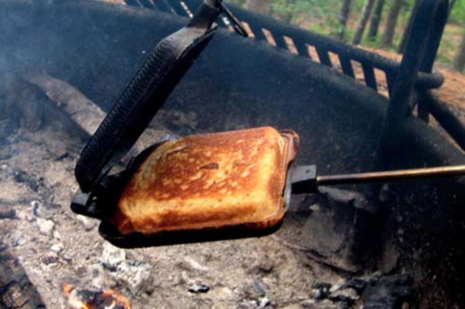 Grilled cheese made in a campfire with a pie iron. : r/grilledcheese